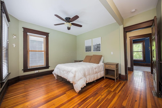 199 E Gates St, Columbus, OH 43206 - bedroom with wood-type flooring and a ceiling fan