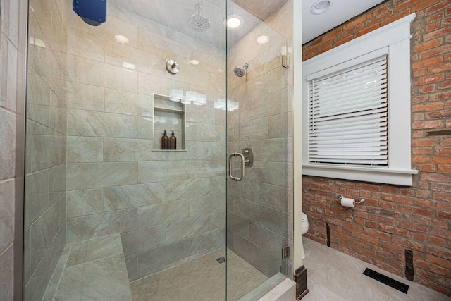 199 E Gates St, Columbus, OH 43206 - full bathroom with a shower stall and brick wall