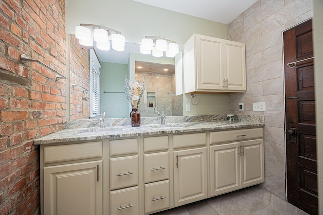 199 E Gates St, Columbus, OH 43206 - bathroom featuring a shower stall, double vanity, and brick wall