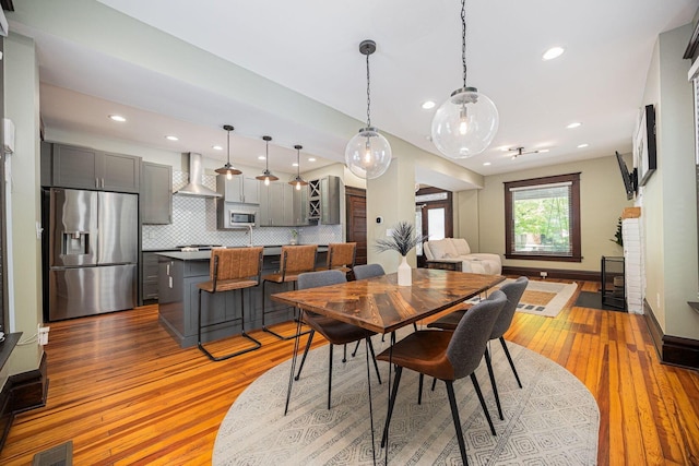 199 E Gates St, Columbus, OH 43206 - dining room with wood-type flooring and recessed lighting