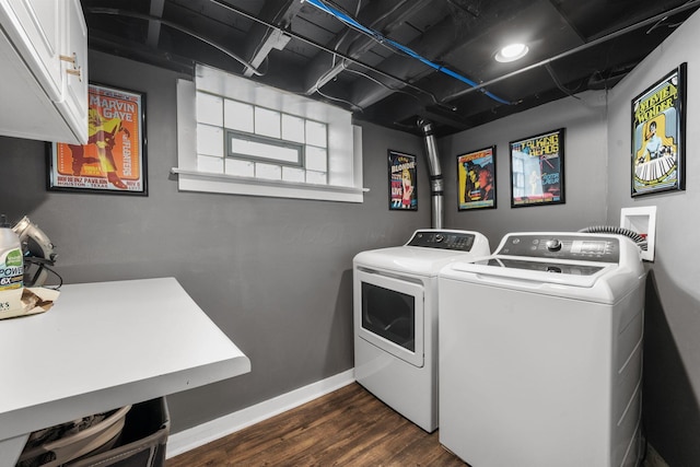 70 N Cassingham Rd, Columbus, OH 43209 - laundry area featuring washer and clothes dryer, cabinet space, and dark wood-style flooring