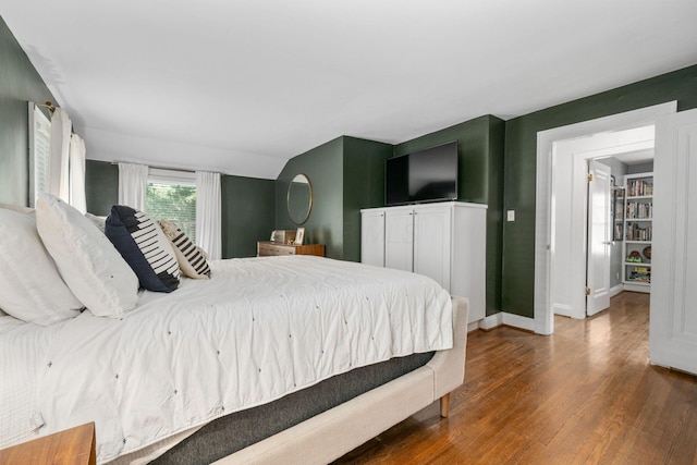 70 N Cassingham Rd, Columbus, OH 43209 - bedroom featuring wood finished floors and baseboards