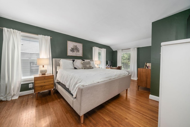 70 N Cassingham Rd, Columbus, OH 43209 - bedroom featuring wood finished floors and lofted ceiling