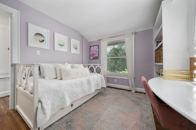 70 N Cassingham Rd, Columbus, OH 43209 - bedroom with lofted ceiling and wood finished floors