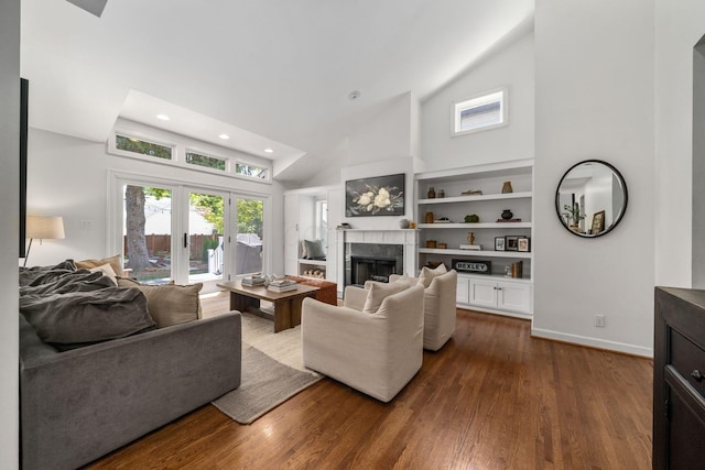 70 N Cassingham Rd, Columbus, OH 43209 - living area with high vaulted ceiling, a fireplace, dark wood-style flooring, and recessed lighting