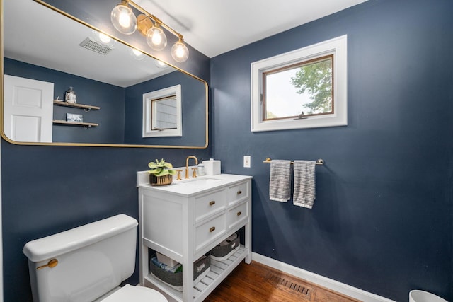 70 N Cassingham Rd, Columbus, OH 43209 - bathroom featuring vanity and wood finished floors