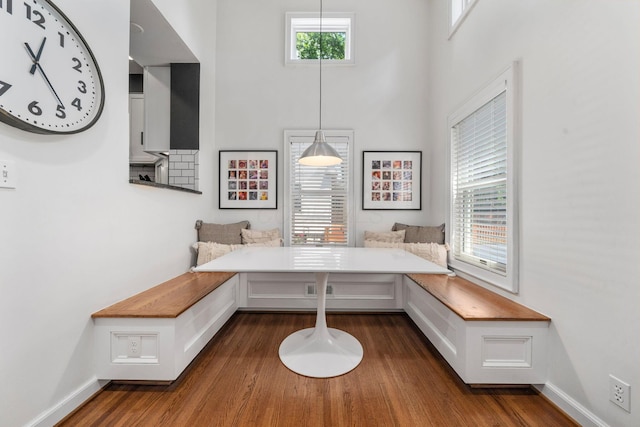 70 N Cassingham Rd, Columbus, OH 43209 - dining area with breakfast area, dark wood finished floors, and a towering ceiling