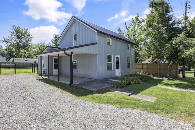 8898 Baker Rd, Stoutsville, OH 43154 - view of home's exterior with a patio area