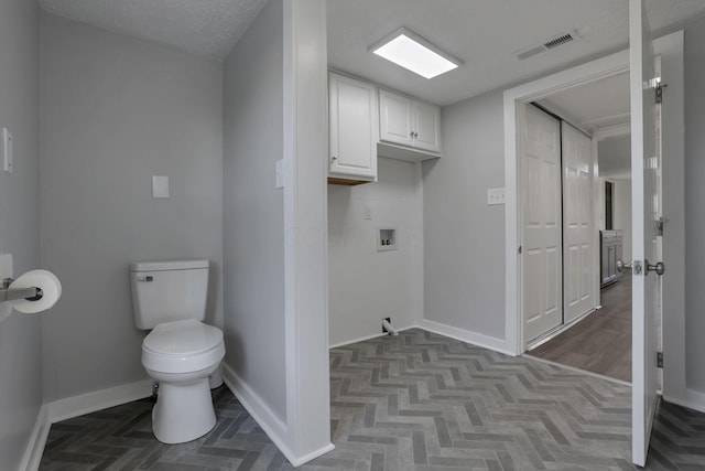 8898 Baker Rd, Stoutsville, OH 43154 - bathroom featuring toilet and baseboards
