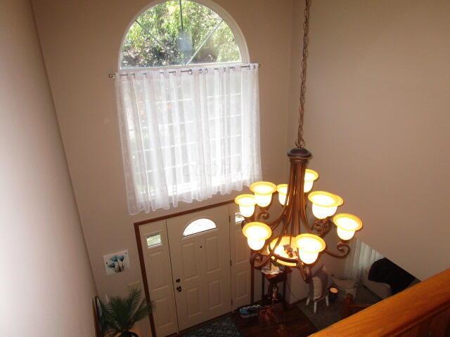 5669 Maplewood Ct, Lewis Center, OH 43035 - entrance foyer with a chandelier
