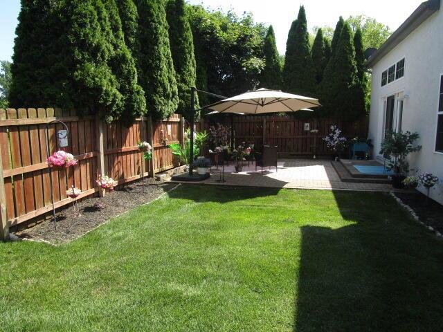 5669 Maplewood Ct, Lewis Center, OH 43035 - view of yard with a patio area