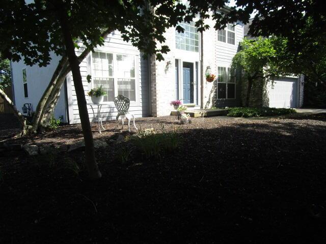 5669 Maplewood Ct, Lewis Center, OH 43035 - view of front of home with a garage