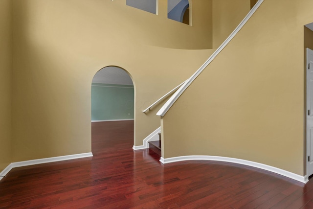 3902 Rivers Run Dr, Lewis Center, OH 43035 - staircase with wood finished floors and arched walkways