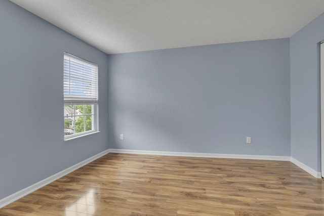 3902 Rivers Run Dr, Lewis Center, OH 43035 - spare room with wood finished floors and baseboards