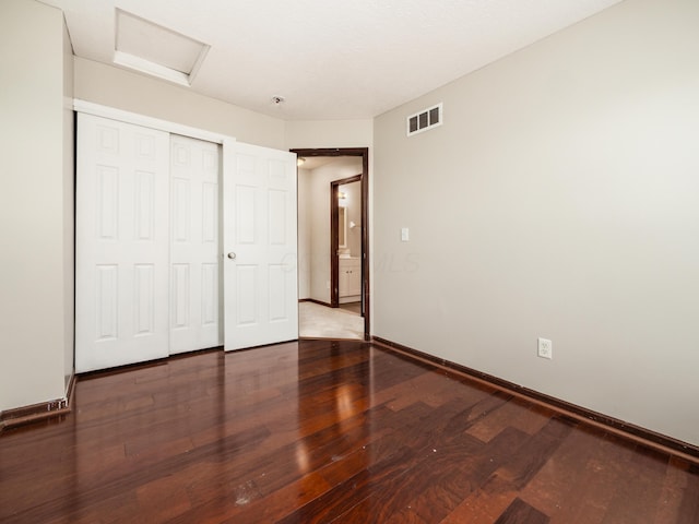419 Sycamore Creek St, Pickerington, OH 43147 - unfurnished bedroom with wood finished floors, attic access, and a closet