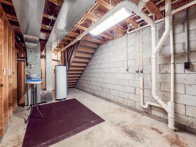 419 Sycamore Creek St, Pickerington, OH 43147 - unfinished basement with gas water heater, heating unit, and stairway