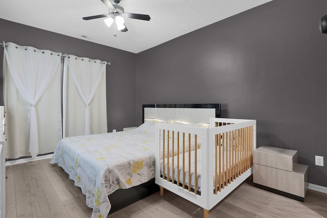 3388 Smileys Cor, Hilliard, OH 43026 - bedroom with wood finished floors and a ceiling fan
