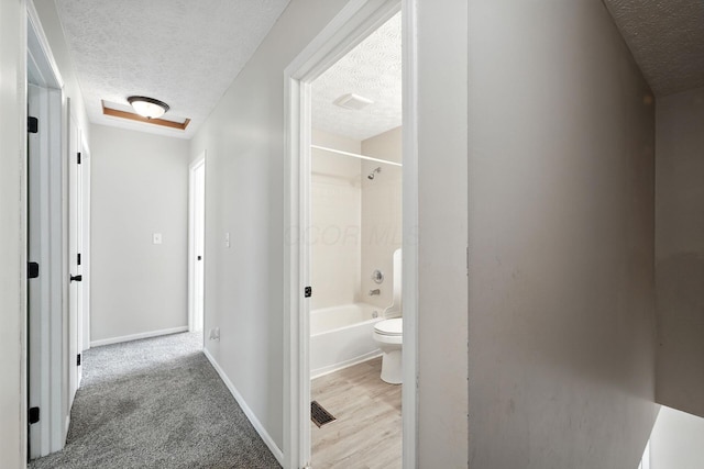 1771 Fern Trail Dr, Lancaster, OH 43130 - corridor with a textured ceiling and baseboards