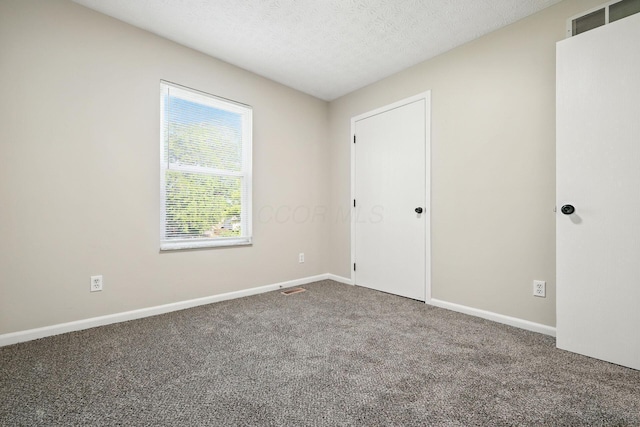 1771 Fern Trail Dr, Lancaster, OH 43130 - unfurnished bedroom featuring carpet and a textured ceiling