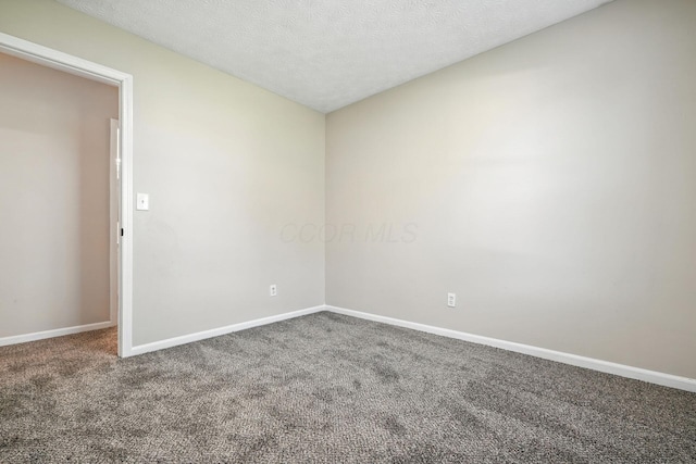 1771 Fern Trail Dr, Lancaster, OH 43130 - empty room with carpet floors and a textured ceiling