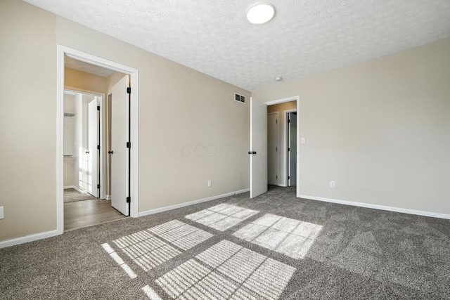 1771 Fern Trail Dr, Lancaster, OH 43130 - unfurnished bedroom featuring carpet floors and a textured ceiling