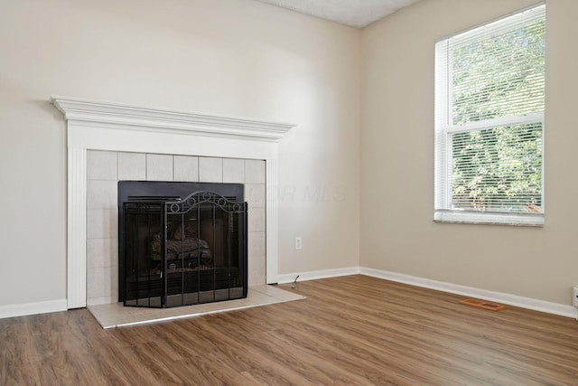 1771 Fern Trail Dr, Lancaster, OH 43130 - detailed view of a tile fireplace and wood finished floors