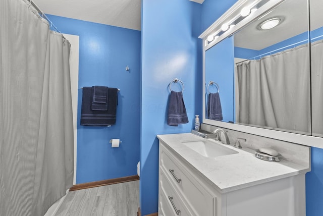 1539 Clubview Blvd S, Columbus, OH 43235 - bathroom featuring vanity, wood finished floors, and curtained shower