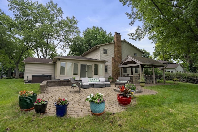 1539 Clubview Blvd S, Columbus, OH 43235 - rear view of property with a hot tub, a gazebo, a patio, an outdoor hangout area, and a lawn