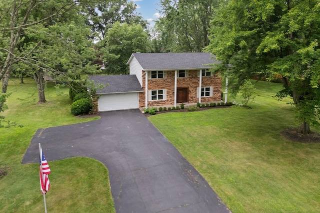 6853 Cedar Brook Pl, New Albany, OH 43054 - view of front facade featuring driveway, an attached garage, brick siding, roof with shingles, and a front yard