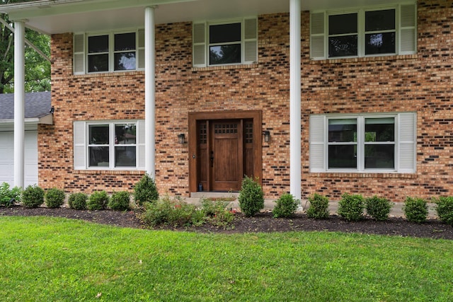 6853 Cedar Brook Pl, New Albany, OH 43054 - view of front facade with a front lawn and brick siding