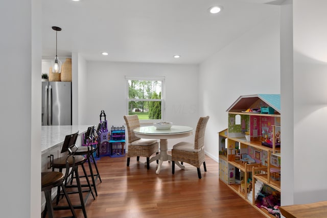 6853 Cedar Brook Pl, New Albany, OH 43054 - dining space featuring wood finished floors and recessed lighting