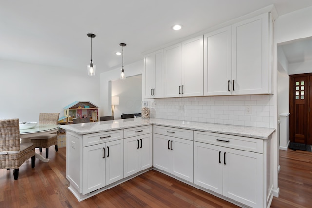 6853 Cedar Brook Pl, New Albany, OH 43054 - kitchen featuring dark wood finished floors, white cabinetry, decorative backsplash, and recessed lighting