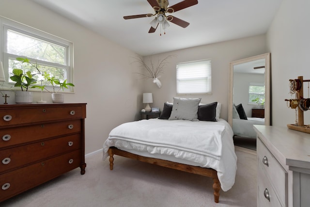 6853 Cedar Brook Pl, New Albany, OH 43054 - bedroom with light colored carpet and a ceiling fan
