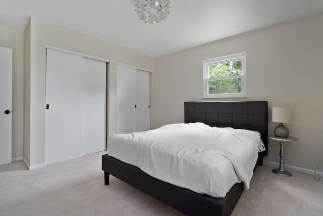 6853 Cedar Brook Pl, New Albany, OH 43054 - bedroom with multiple closets and carpet