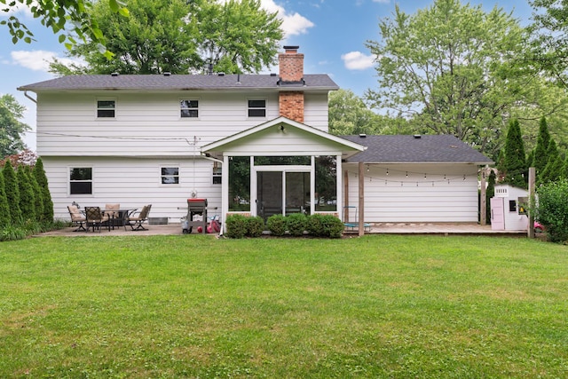 6853 Cedar Brook Pl, New Albany, OH 43054 - rear view of property with a chimney, a patio area, and a lawn