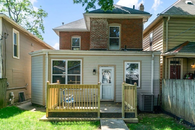 994 Harrison Ave, Columbus, OH 43201 - view of front of property with brick siding and a wooden deck