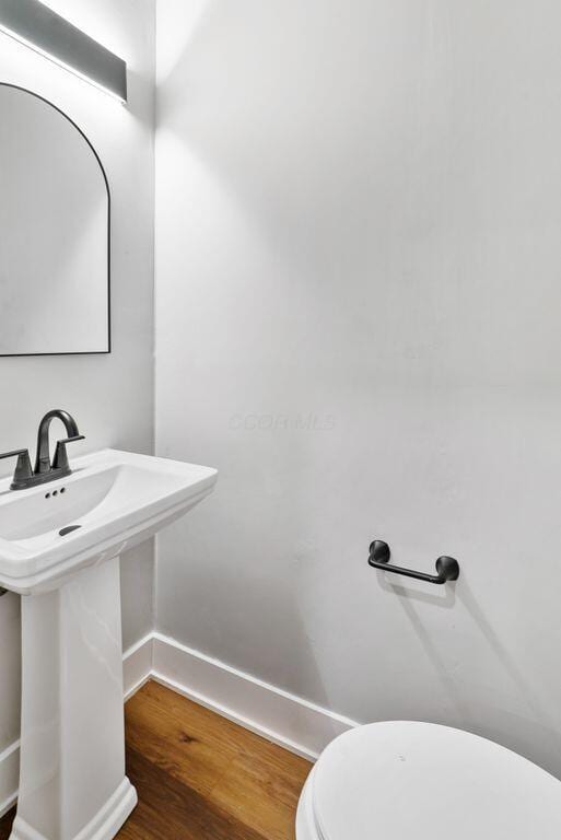 994 Harrison Ave, Columbus, OH 43201 - half bath with wood finished floors and baseboards
