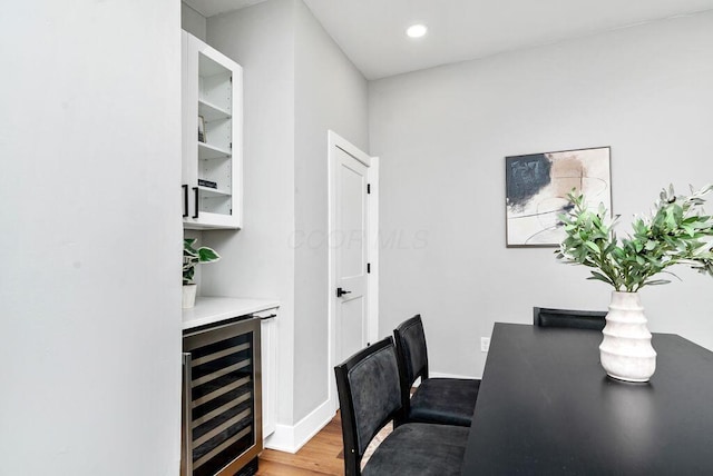 994 Harrison Ave, Columbus, OH 43201 - office space featuring beverage cooler, wood finished floors, recessed lighting, and a dry bar