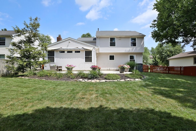 2253 Otter Ln, Dublin, OH 43016 - rear view of house with a patio area and a chimney