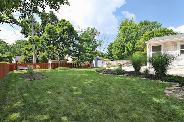 2253 Otter Ln, Dublin, OH 43016 - fenced backyard with a storage unit