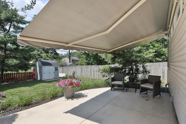 2253 Otter Ln, Dublin, OH 43016 - fenced backyard with a patio and a storage unit