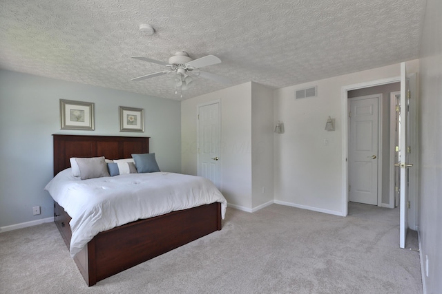 2253 Otter Ln, Dublin, OH 43016 - bedroom featuring carpet floors, ceiling fan, and a textured ceiling