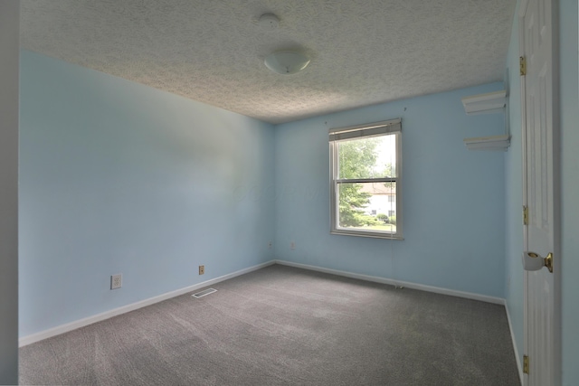 2253 Otter Ln, Dublin, OH 43016 - unfurnished room featuring a textured ceiling and carpet floors