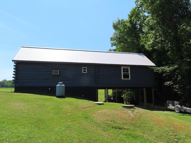 485 Springer Rd, Chillicothe, OH 45601 - back of property with a yard and a metal roof