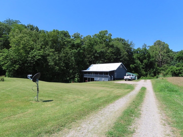 485 Springer Rd, Chillicothe, OH 45601 - view of dirt / gravel driveway with a forest view