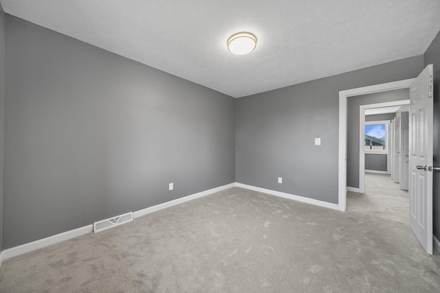 3654 Arnelle Rd, Columbus, OH 43228 - spare room featuring carpet and a textured ceiling