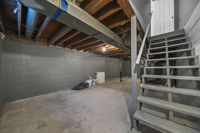 3654 Arnelle Rd, Columbus, OH 43228 - unfinished basement with stairway and concrete block wall
