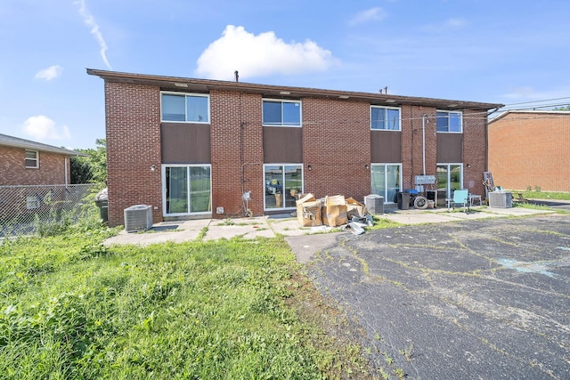 3654 Arnelle Rd, Columbus, OH 43228 - rear view of property featuring brick siding