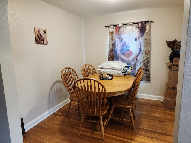 850 Grafton Rd, Newark, OH 43055 - dining space with wood finished floors and baseboards