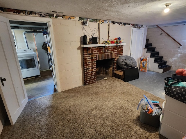 850 Grafton Rd, Newark, OH 43055 - living area featuring washer / clothes dryer, concrete flooring, a textured ceiling, stairway, and concrete block wall